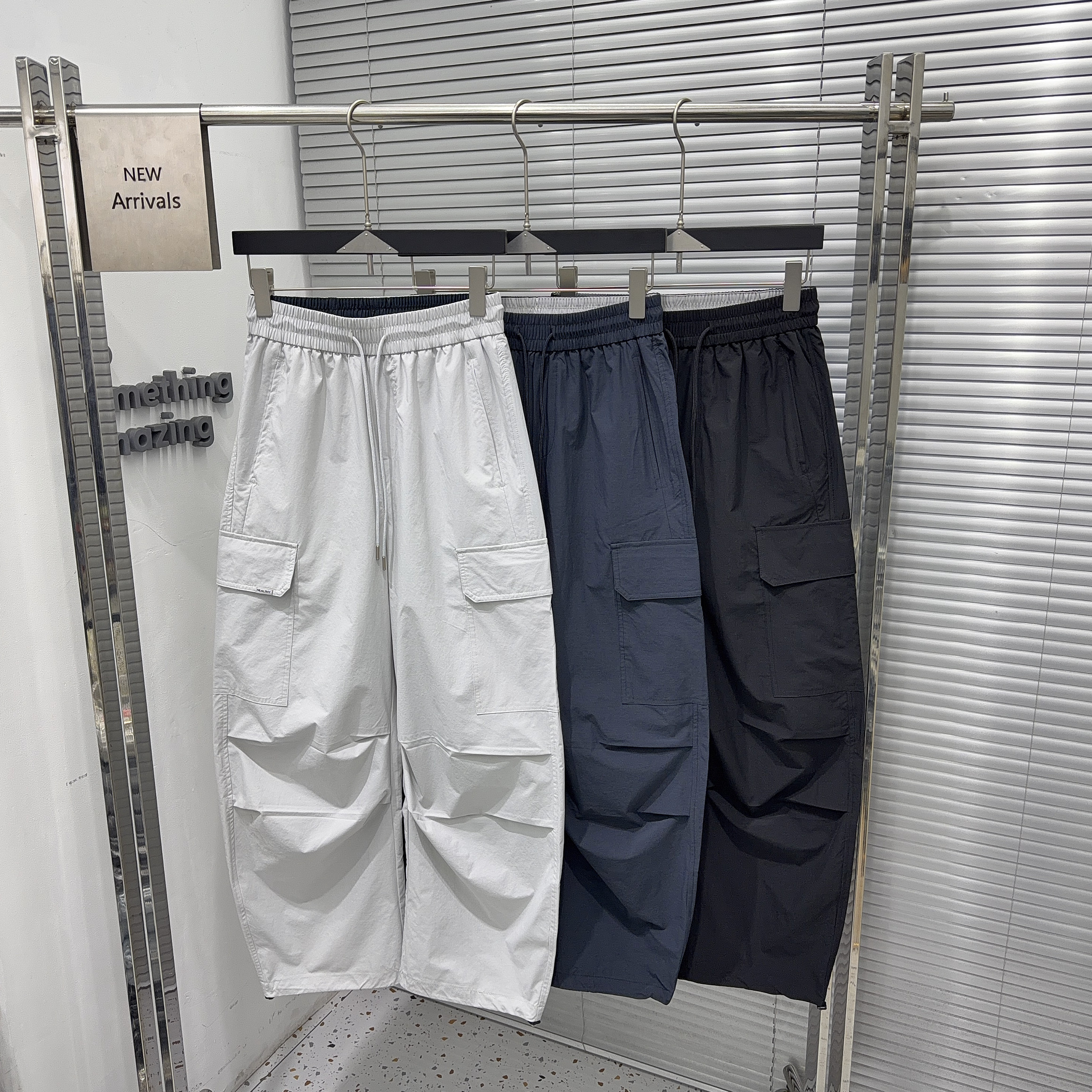 夏季美式休闲痞帅大口袋工装裤男直筒宽松潮牌抽绳哈伦伞兵裤子男