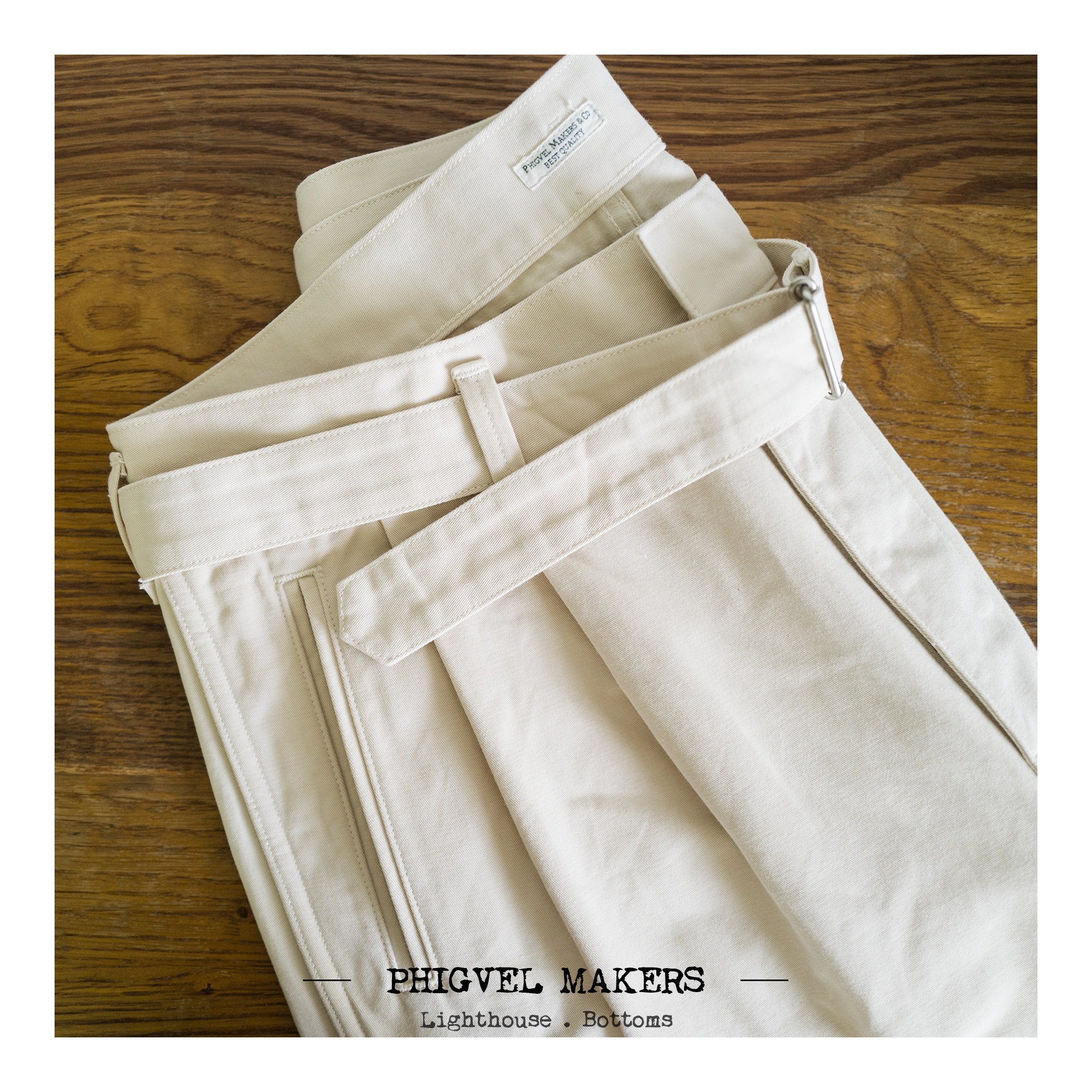 亚洲裁剪两褶腰带短裤