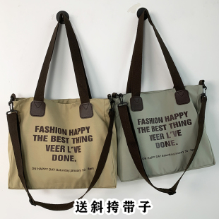 帆布包包男女斜跨ins风托特大容量旅行学生上课百搭带拉链手提包