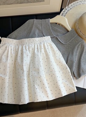 白色碎花半身裙女夏季新款高腰宽松百搭小个子a字松紧腰花苞短mfe