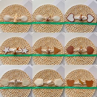 高档牛角扣扣子大衣衣服女搭扣对扣黑色桃心皮扣外套儿童装饰纽扣