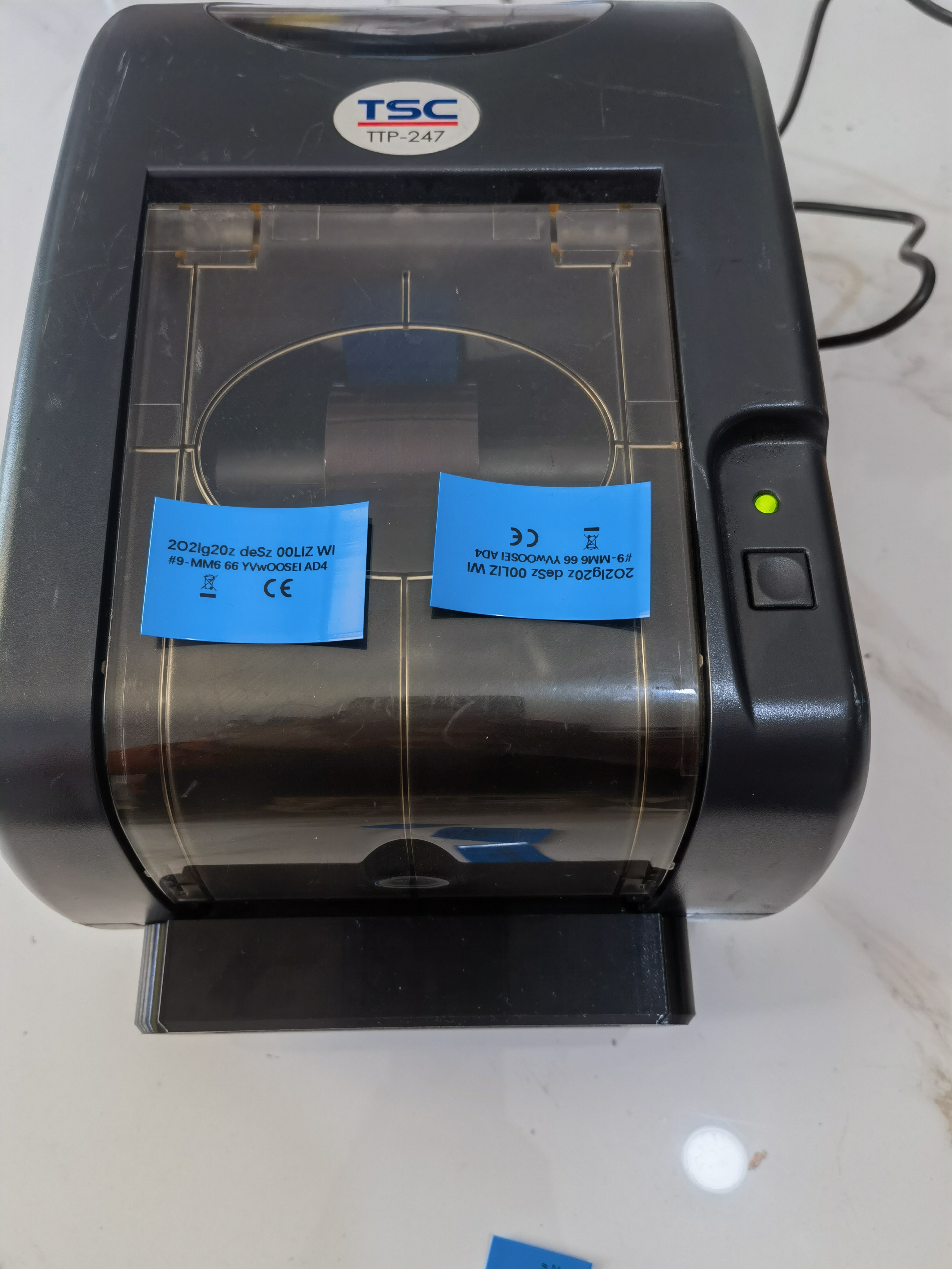 TSC  TTP-247  TTP-345热缩管自动带切刀打印机干洗店水洗唛标签