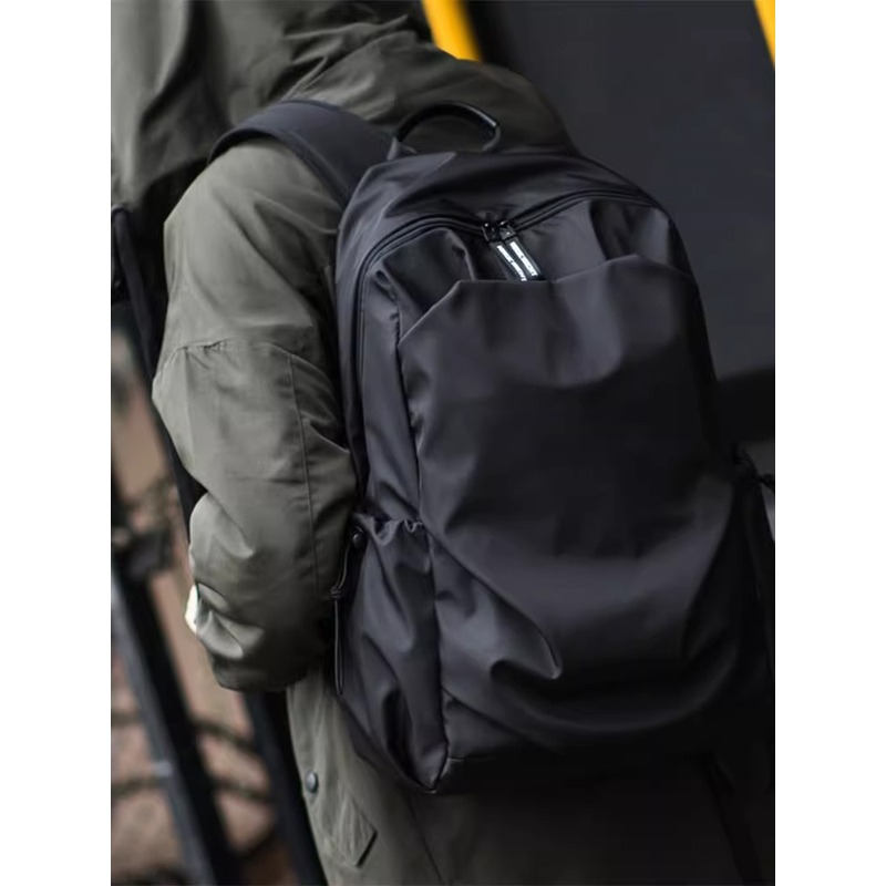 法国CavienKIon书包男女运动防水旅行背包高中大学生电脑包双肩包