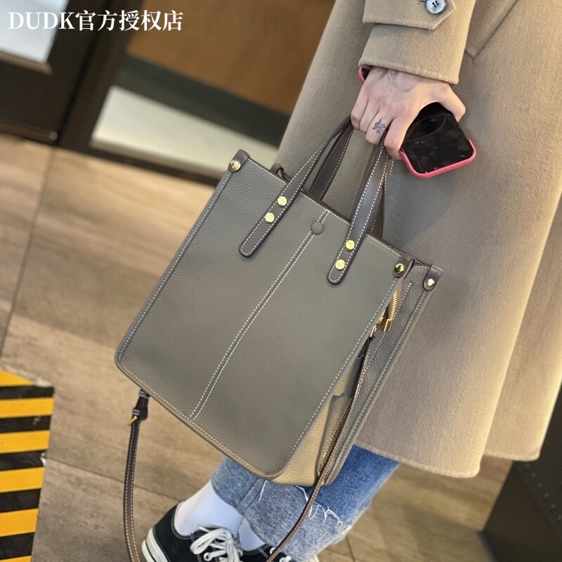 法国DUDK正品真皮女包2026新款大容量时尚公文包手提斜挎托特包潮