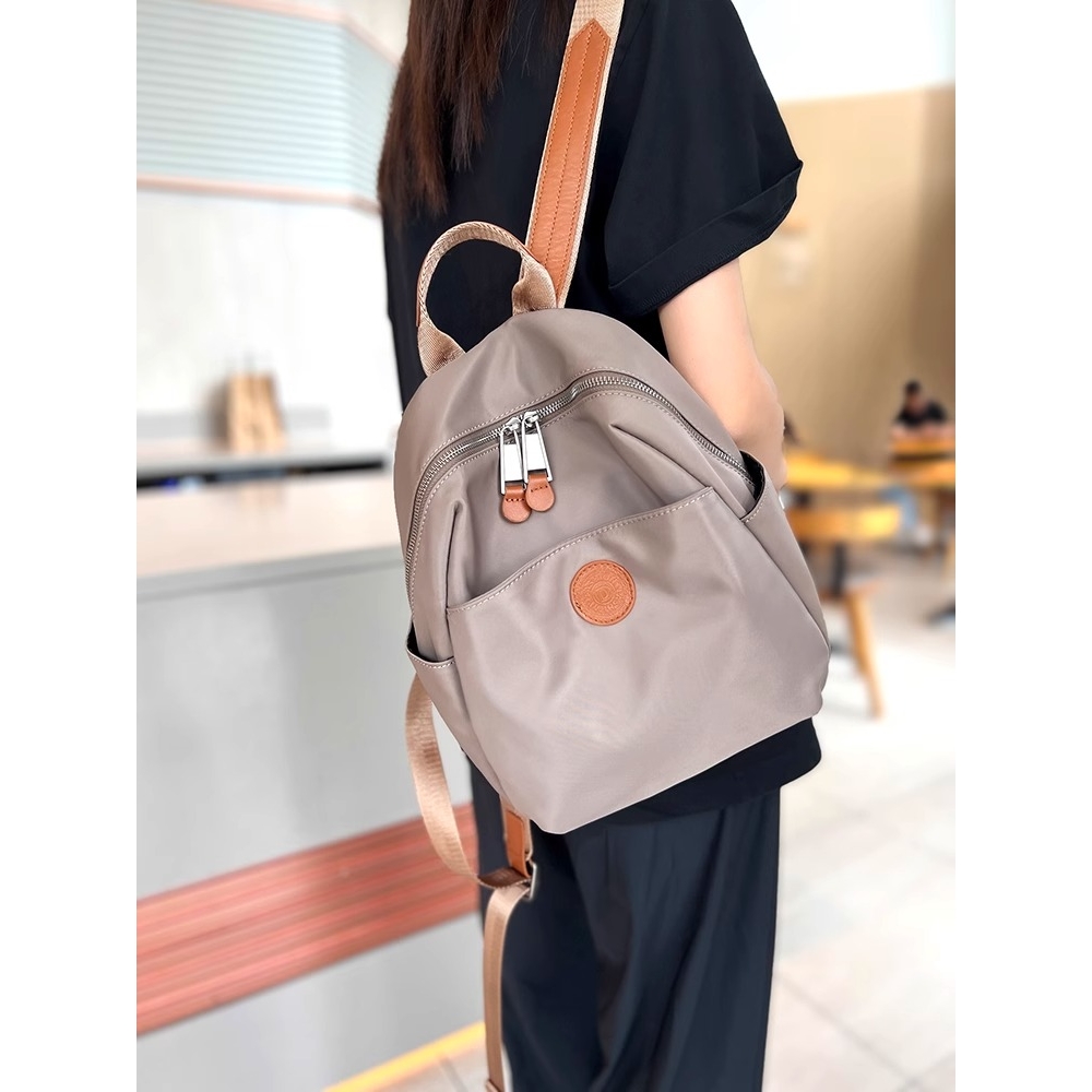 法国ZAMP高级感休闲双肩包女新款牛津布防水轻便百搭旅游电脑背包