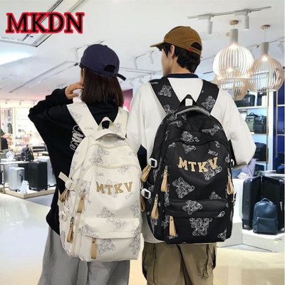 法国MKDN减负护脊书包初中生中学生男生高中生背包大容量女双肩包