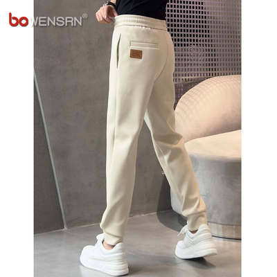 高端欧货休闲卫裤男士2025新款春秋冬季男裤加绒宽松束脚裤子男款