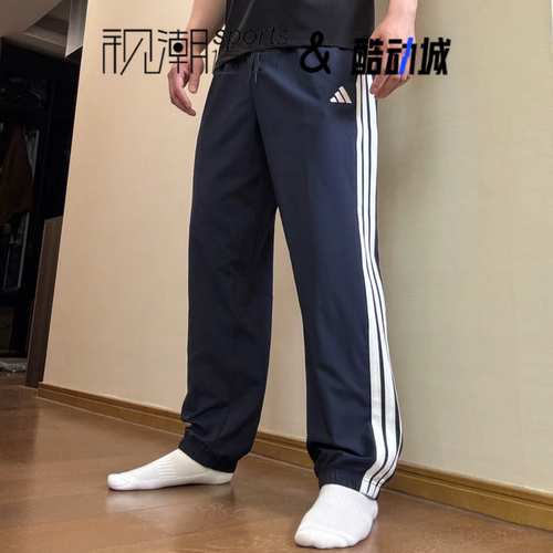阿迪达斯蓝白色束脚长裤运动休闲