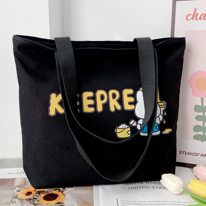 帆布包手提袋女高中学生大容量拎书单肩包黑色上班通勤高级妈咪包