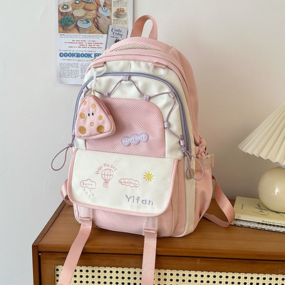 书包女生小学生三到六年级减负护脊超轻便大容量初中生双肩包新款