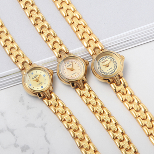 老海达牌圆形镀金大气简约金色发条手动机械女表库存全新