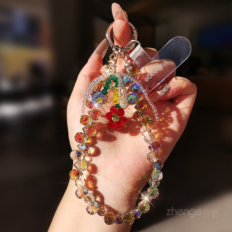 花朵水晶手机链ins女精致高级感手作串珠挂件饰品手腕短款户外旅游出行防丢手提链带子电话套壳手机挂绳新品