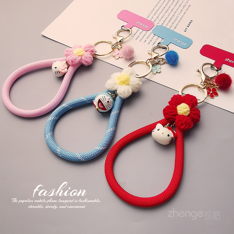 手机挂绳女士秋冬季便携卡通可爱挂件毛线小花编织手腕绳短款户外登山旅游防丢摔加粗手提链电话套壳吊绳新品