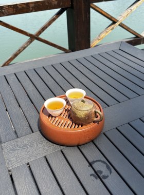 2026 年新品电木黄料小茶盘简约现代圆形潮汕功夫茶具蓄水盘 18*5
