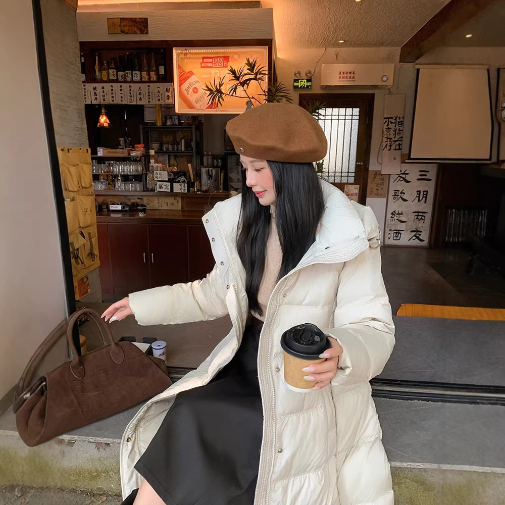 欧洲站2025新款羽绒服女长款气质显瘦保暖白鸭绒高级感连帽外套潮