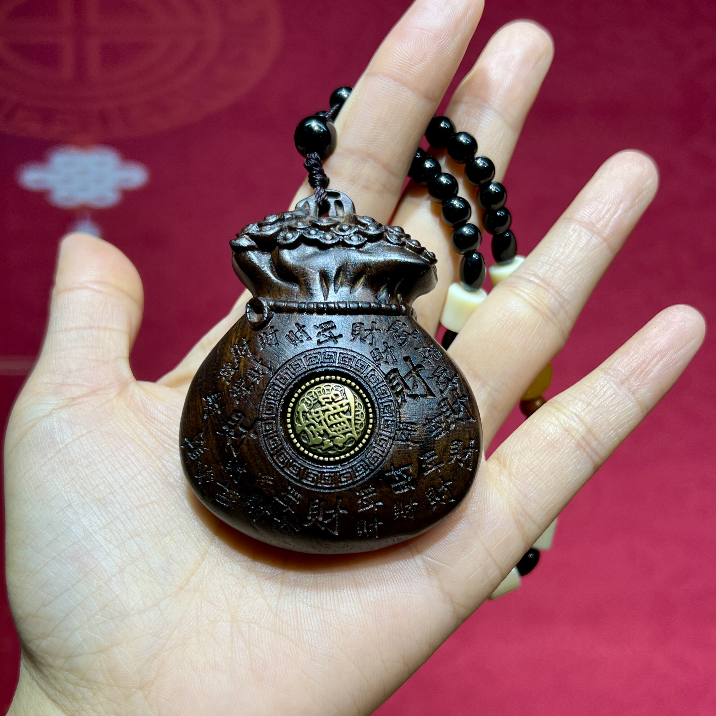 沉香木福袋财袋手把件招财进宝摆件创意中式挂饰车挂手把件工艺品图片