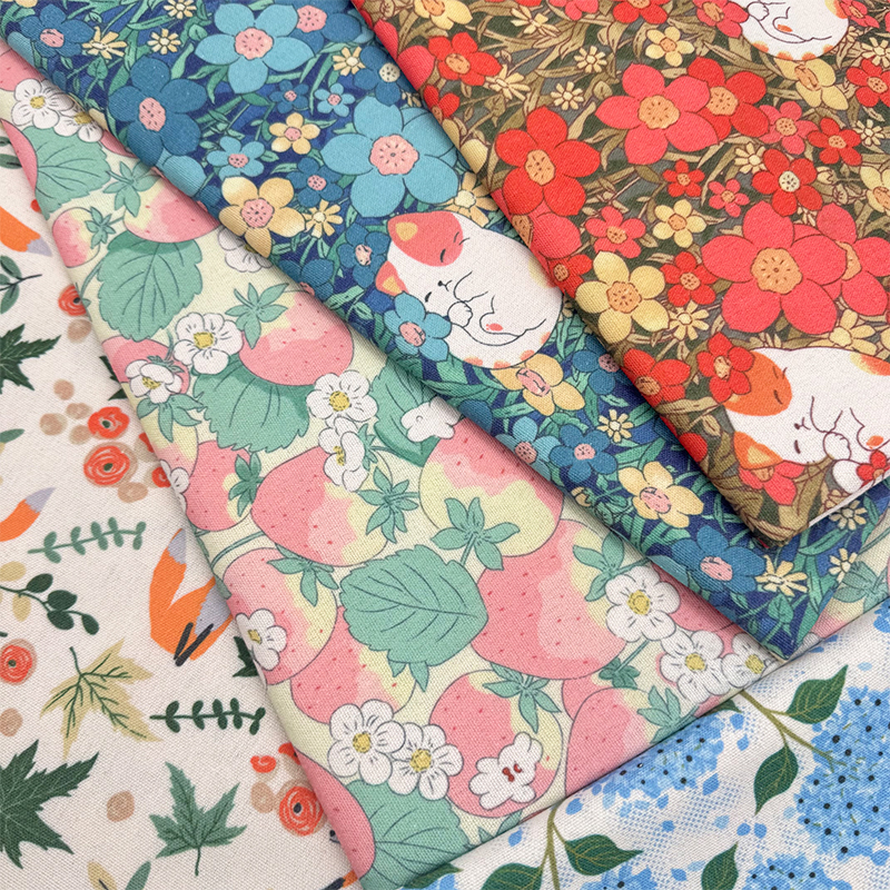 卡通龙猫印花布加密棉麻布料装饰桌布沙发布窗帘面料diy书皮包布