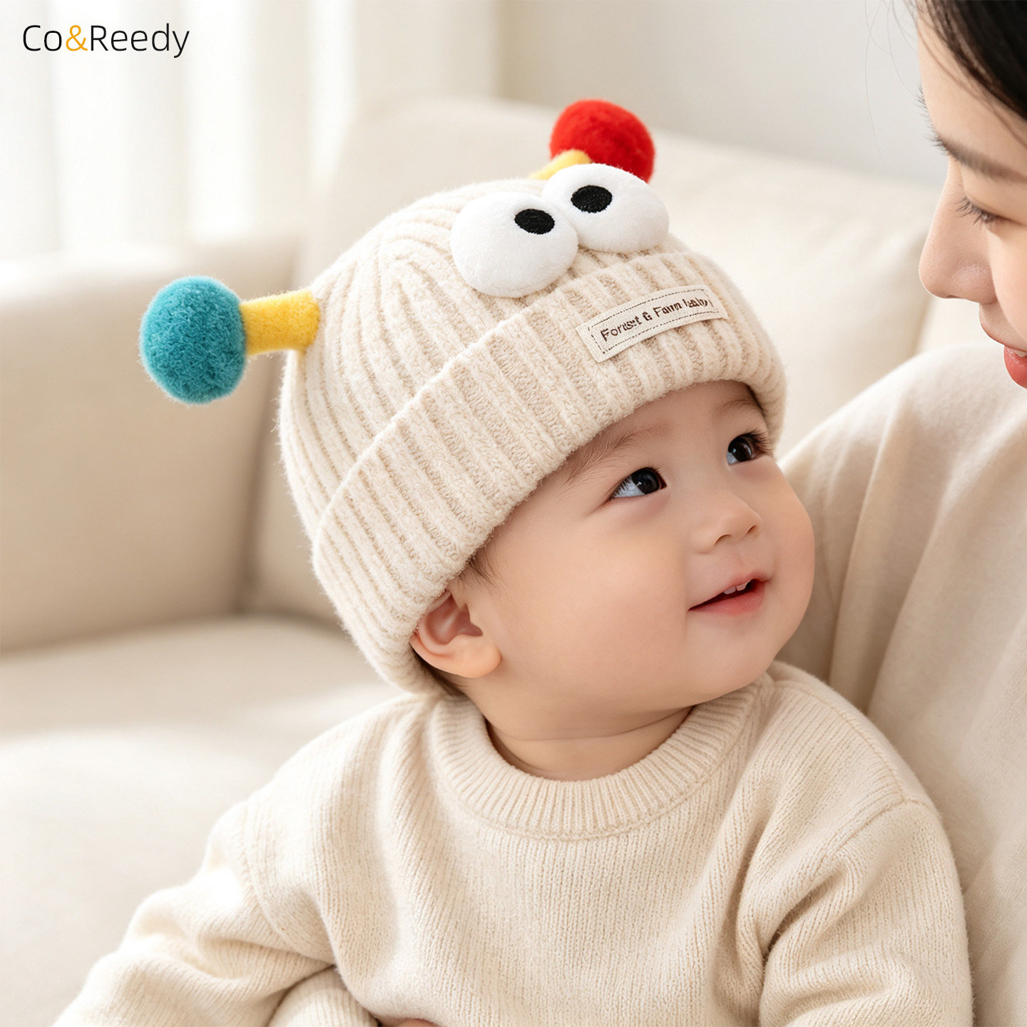婴儿冬季保暖针织大眼弹簧球帽