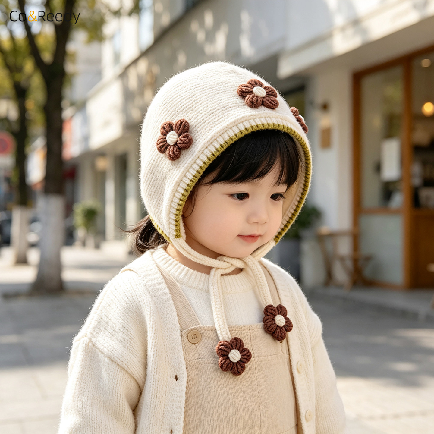 冬季女婴保暖护耳花朵绑带毛线帽