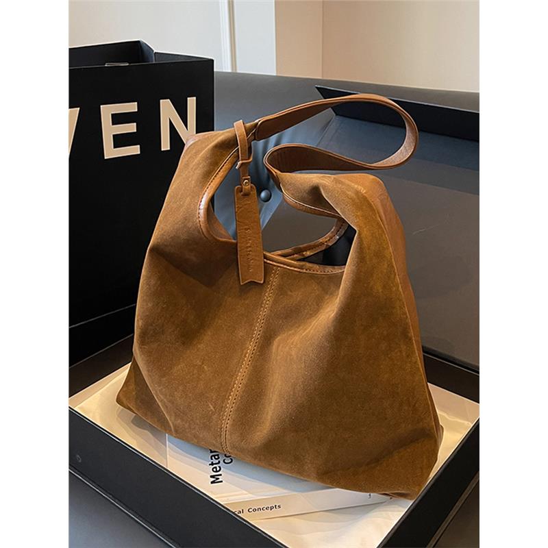 休闲复古麂皮绒面包包2025新款女包秋冬洋气百搭单肩包爆款水桶包