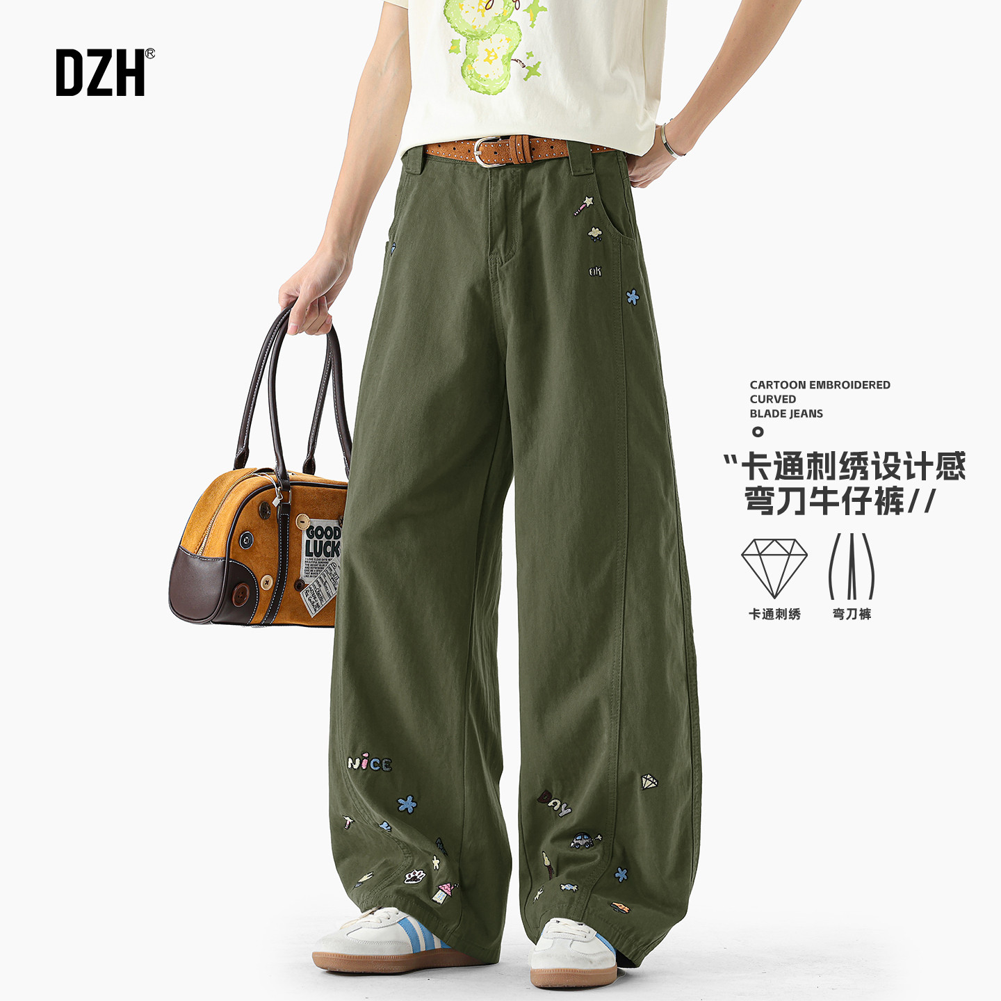 男士绿色卡通刺绣牛仔裤男款美式高街弯刀裤2026新款裤子百搭潮流