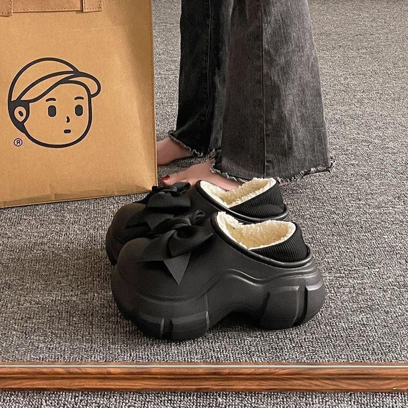 韩版可爱仙女蝴蝶结洞洞鞋女2025冬季新款厚底时尚外穿踩屎感棉鞋