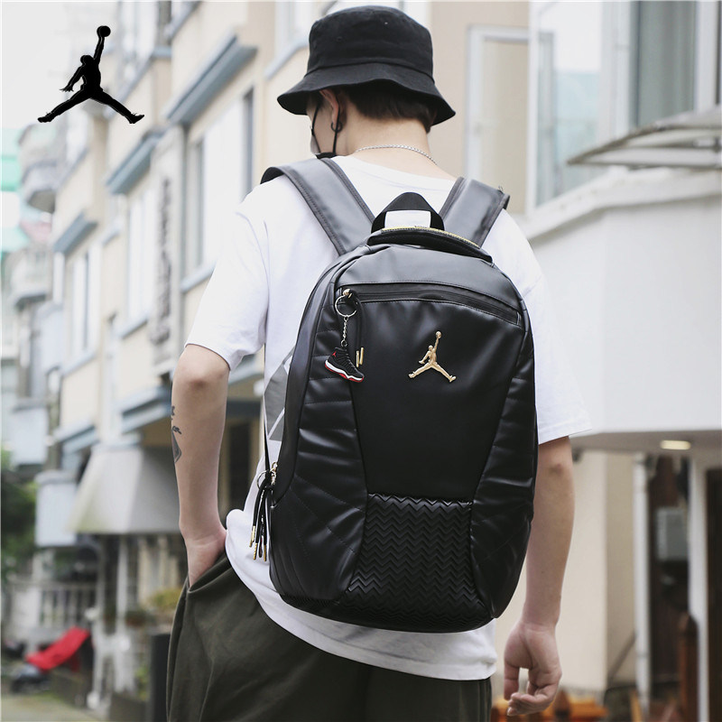 正品乔丹双肩包aj背包男熊猫户外旅行运动大容量男女初中学生书包