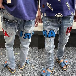新款AM红蓝buff修身双拼儿童牛仔裤潮牌贴布破洞小脚刺绣大童裤子