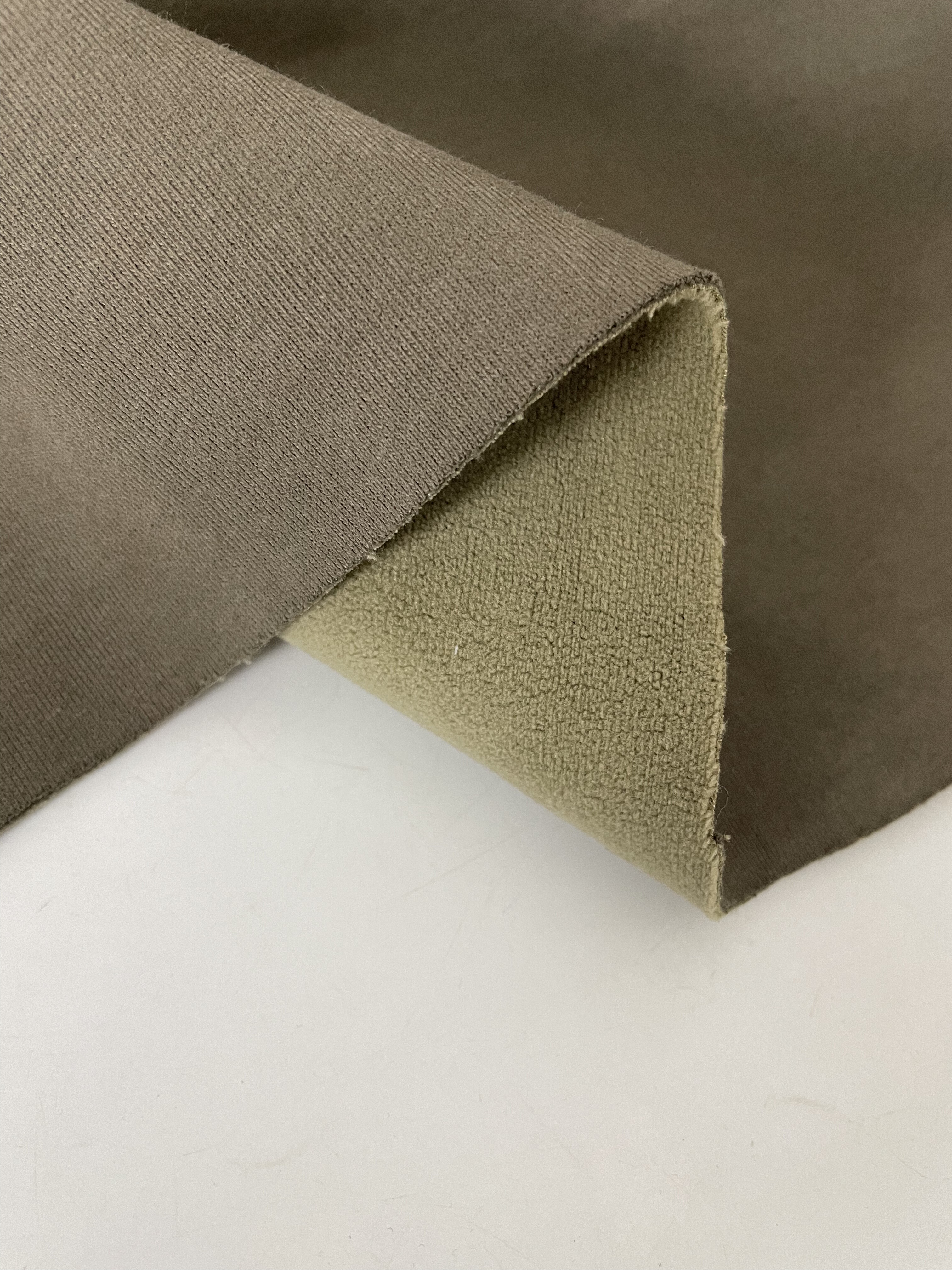 高端定制针织复合奥利绒布头柔软细腻冬天保暖裤子外套纯棉布料