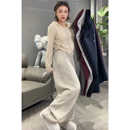 秋冬新款小标口袋松紧腰弯刀卫裤