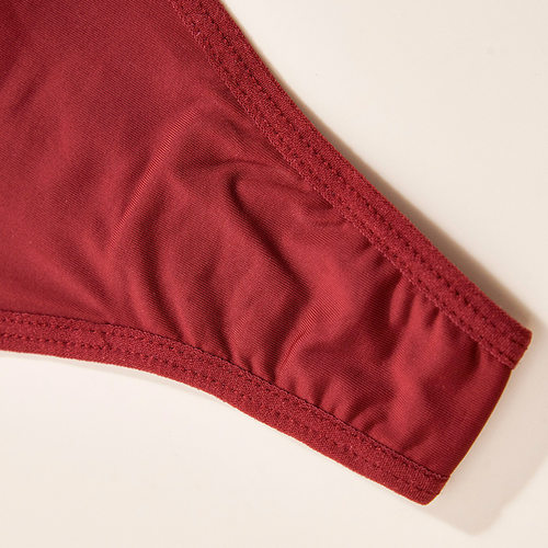 新款纯色性感丁字裤女个性流苏镂空痕内裤透气舒适女士内裤低腰