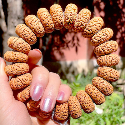 龙鳞凤尾桃核手串磨盘桩