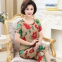 Mùa hè trung niên đồ ngủ phụ nữ cotton lụa mẹ mỏng phần ngắn tay trung niên nhà quần áo cotton nhân tạo phù hợp với hai mảnh - Quần áo của mẹ quần áo cho người trung niên