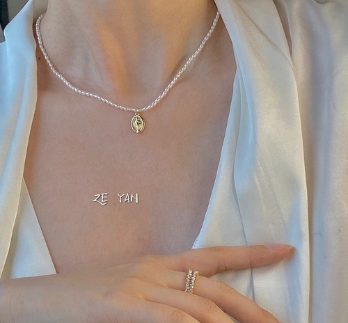 原创美国包金女王风圆牌淡水珍珠