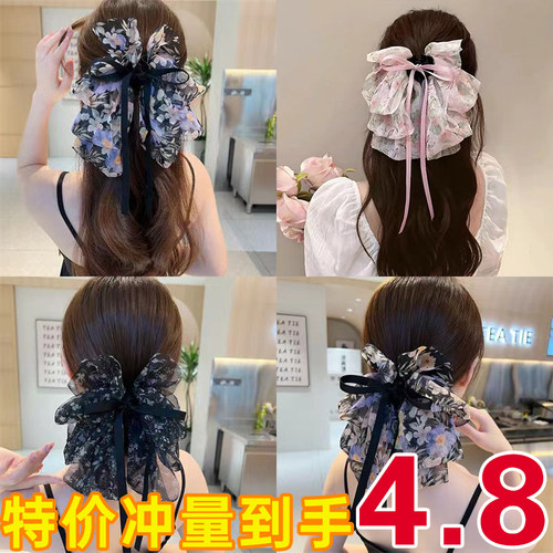 超仙碎花蝴蝶结飘带抓夹女