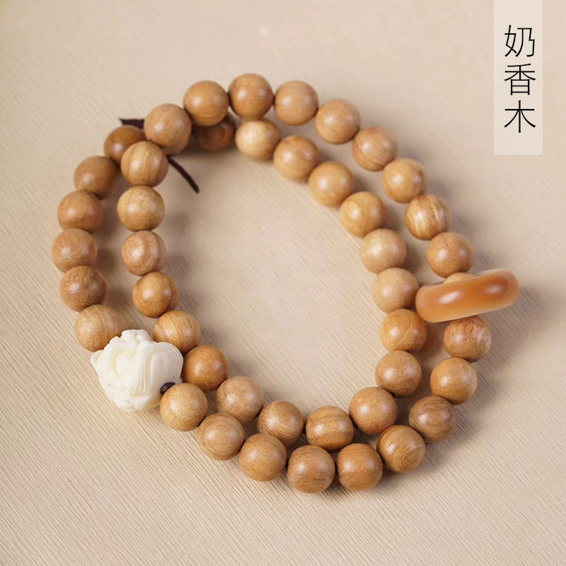 巴布亚念珠奶文玩厂家男女款圈圈规格香木DIY手链醒狮首饰0.8