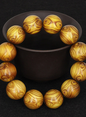 供应黄金木鬼脸对眼手串2