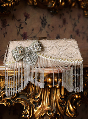 血液供给原创◆斯拉夫千金 重工闪钻蝴蝶结设计晚宴手拿包晚宴包