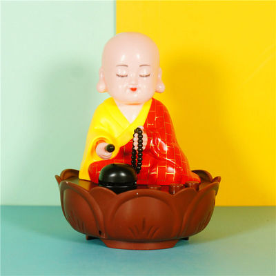 太阳能汽车摇头摆件自动木鱼小沙弥车内装饰用品车载摆件