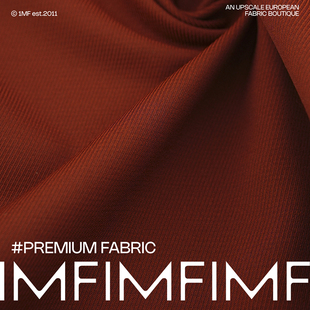 意大利进口 羊毛交织面料橘黑色斜纹双层可剥外套料宽145CM