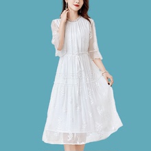 大码真丝连衣裙女2025新款海边白色连衣裙女高级感桑蚕丝伴娘裙子