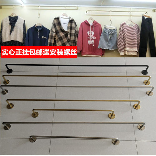 金色服装店展示架上墙实心墙上