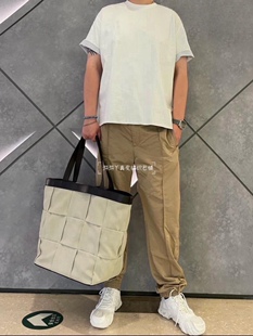 百搭新款轻便休闲感托特包大编格配真皮男女通用单肩手提帆布包袋