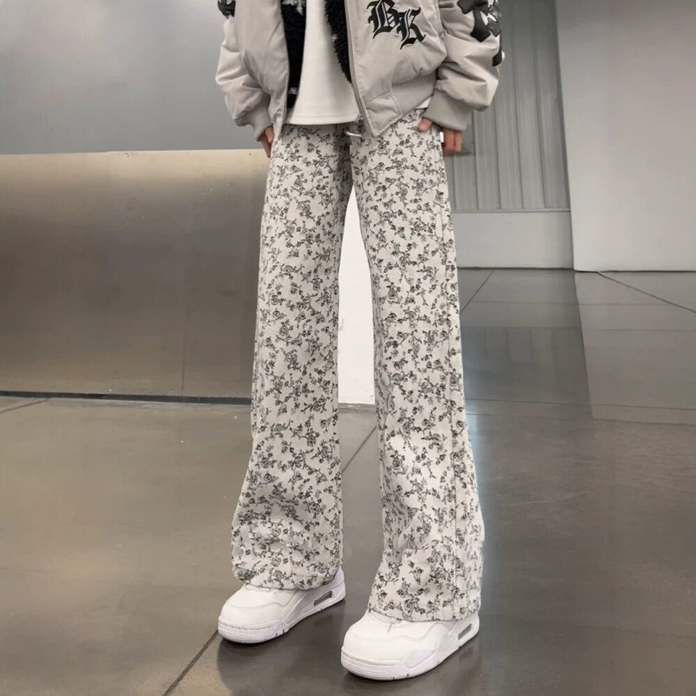 美式复古碎花满印牛仔裤男款高级感潮牌水洗弯刀裤子直筒微喇长裤