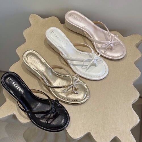 StarKeLa夏新款草编中跟圆头纯色蝴蝶结坡跟夹脚趾人字拖鞋外穿女