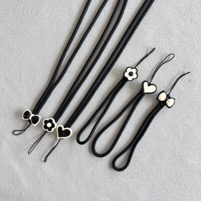 秋冬新款高定黑白色系褶皱爱心花朵蝴蝶结手机壳挂脖绳短款手腕绳