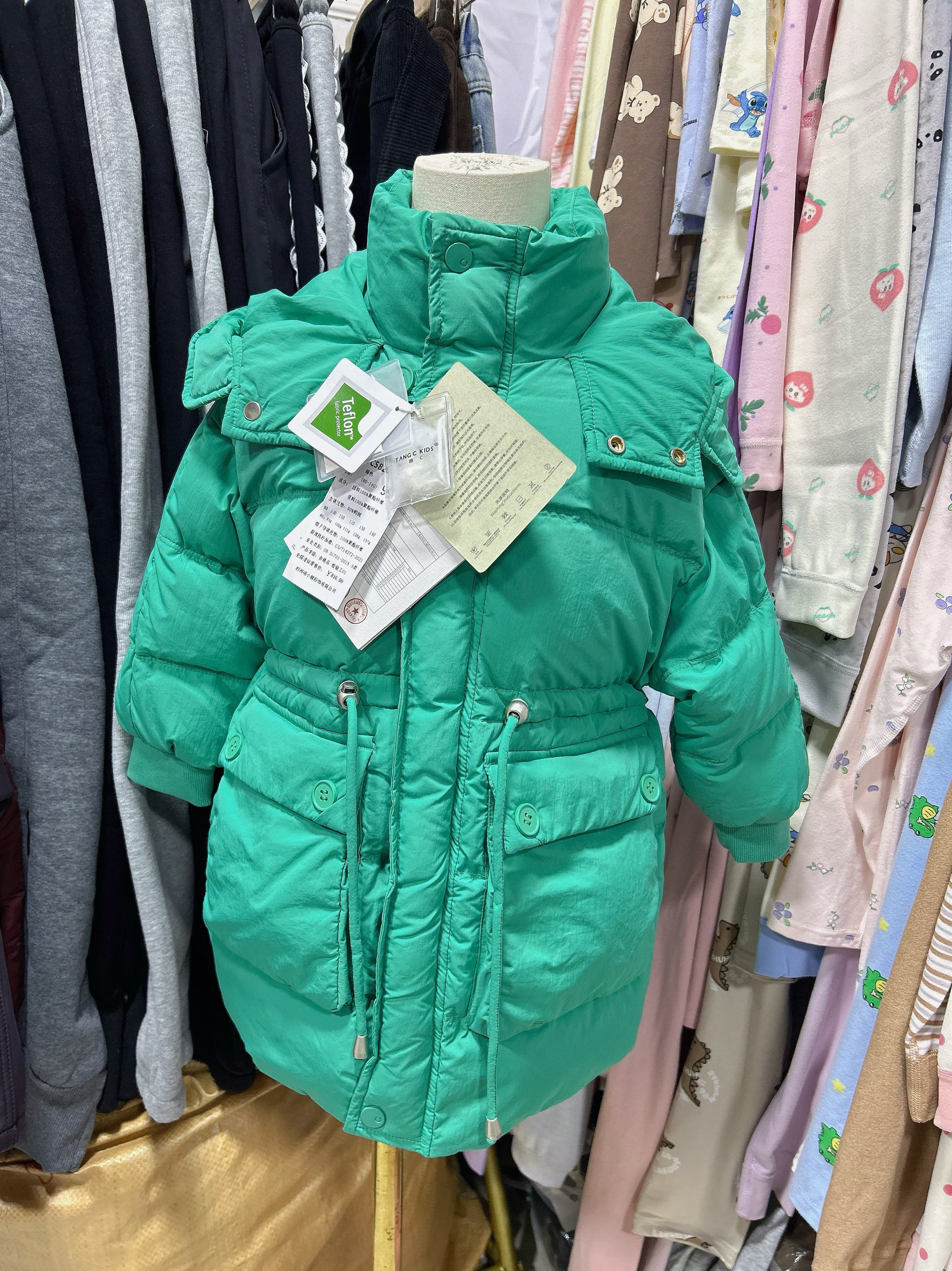 2025冬糖C男女中小童90-140码收腰中长款绿色带帽羽绒服