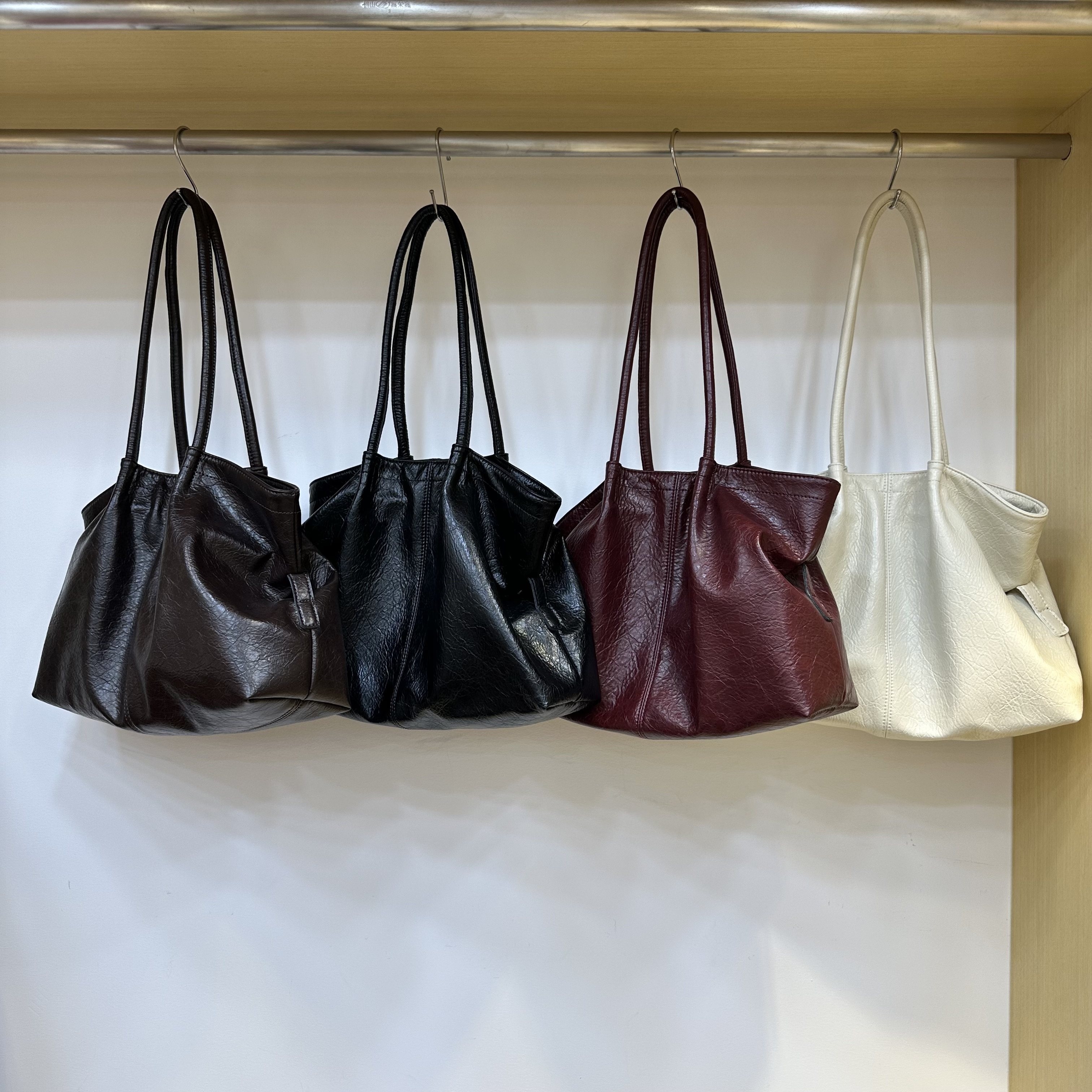 欧比 韩版时尚纯色软皮质感慵懒风随性百搭上班通勤单肩腋下大包