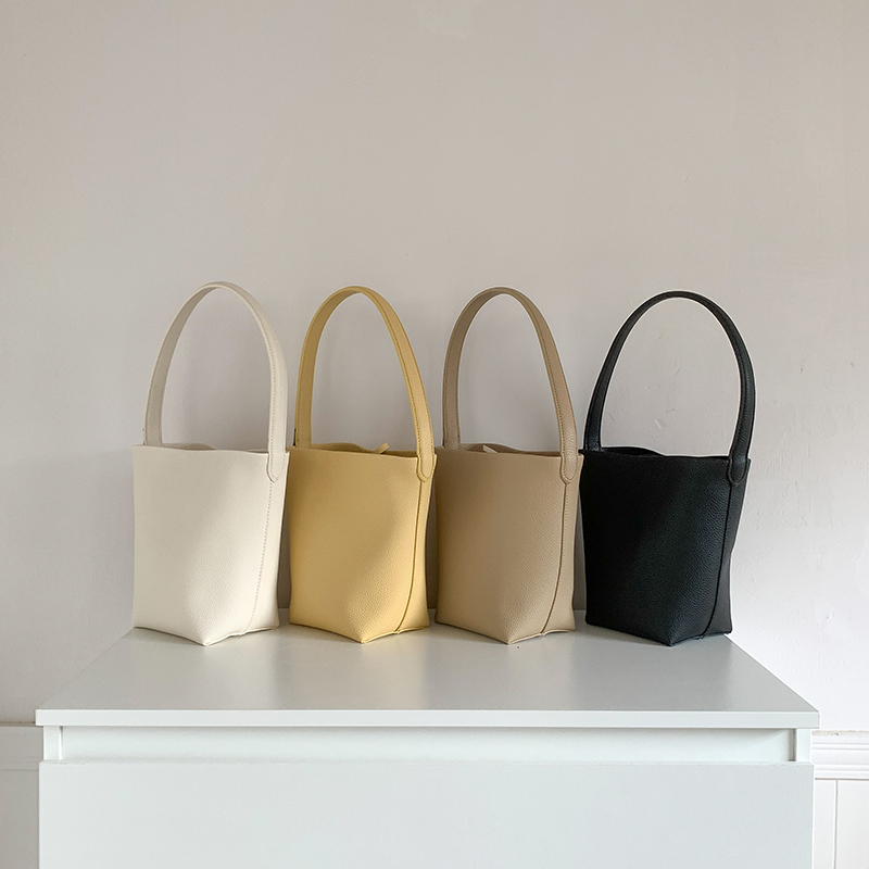 简约风日常手提单肩腋下水桶包