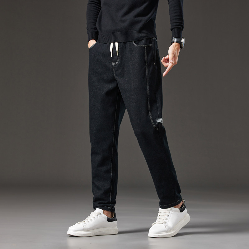 2025秋冬款松紧腰高弹力牛仔裤男青年微哈伦裤弹性长裤子抽绳男装